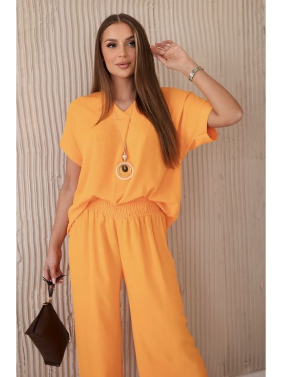 Dámska elegantná súprava s náhrdelníkom, blúzka + nohavice s elastickým pásom, oranžová Dámska elegantná súprava s náhrdelníkom, blúzka + nohavice s elastickým pásom, oranžová